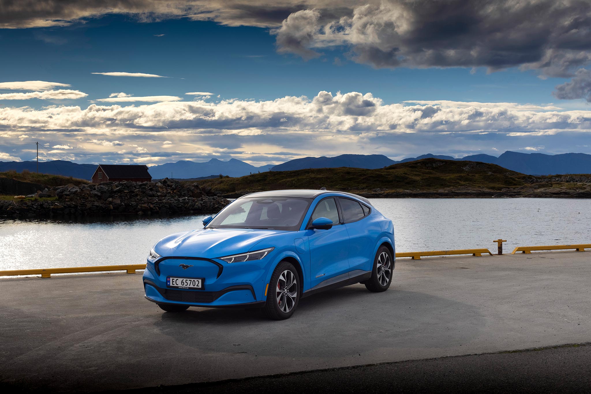 Front three quarters view of the new Ford Mustang Mach E in blue