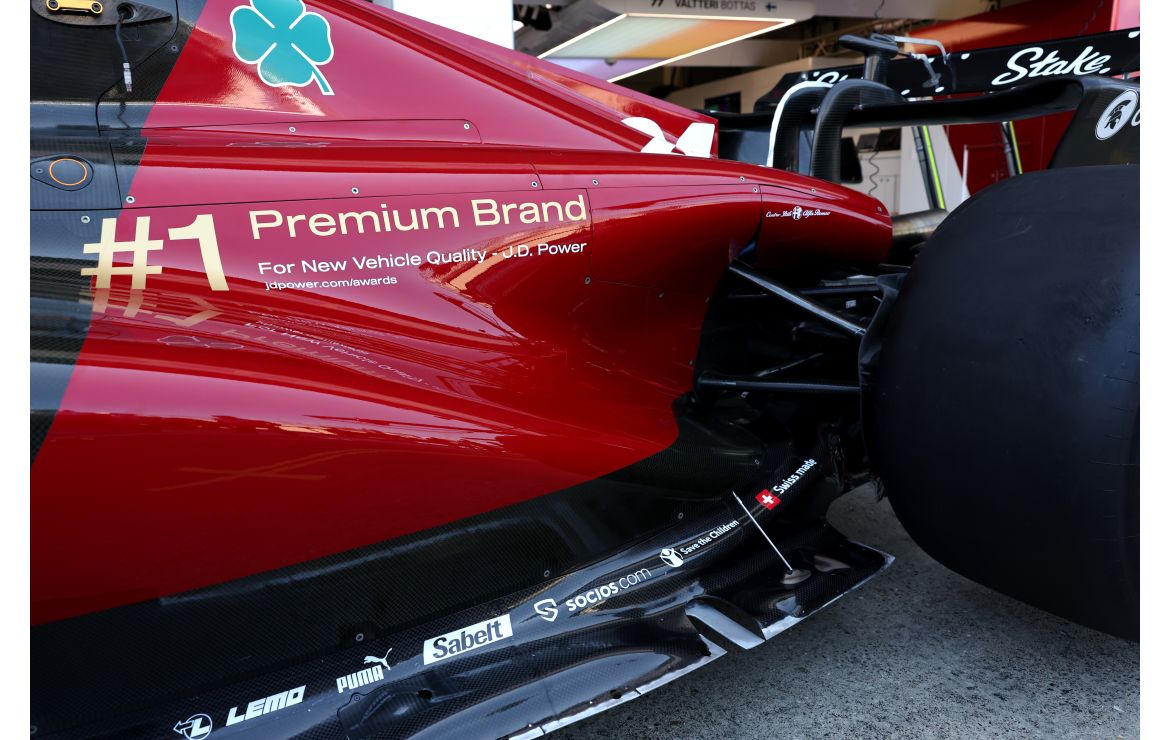 Decals celebrating Alfa Romeo's big win at the recent J.D. Power awards adorn the side of the Alfa Romeo C43 F1 racecar