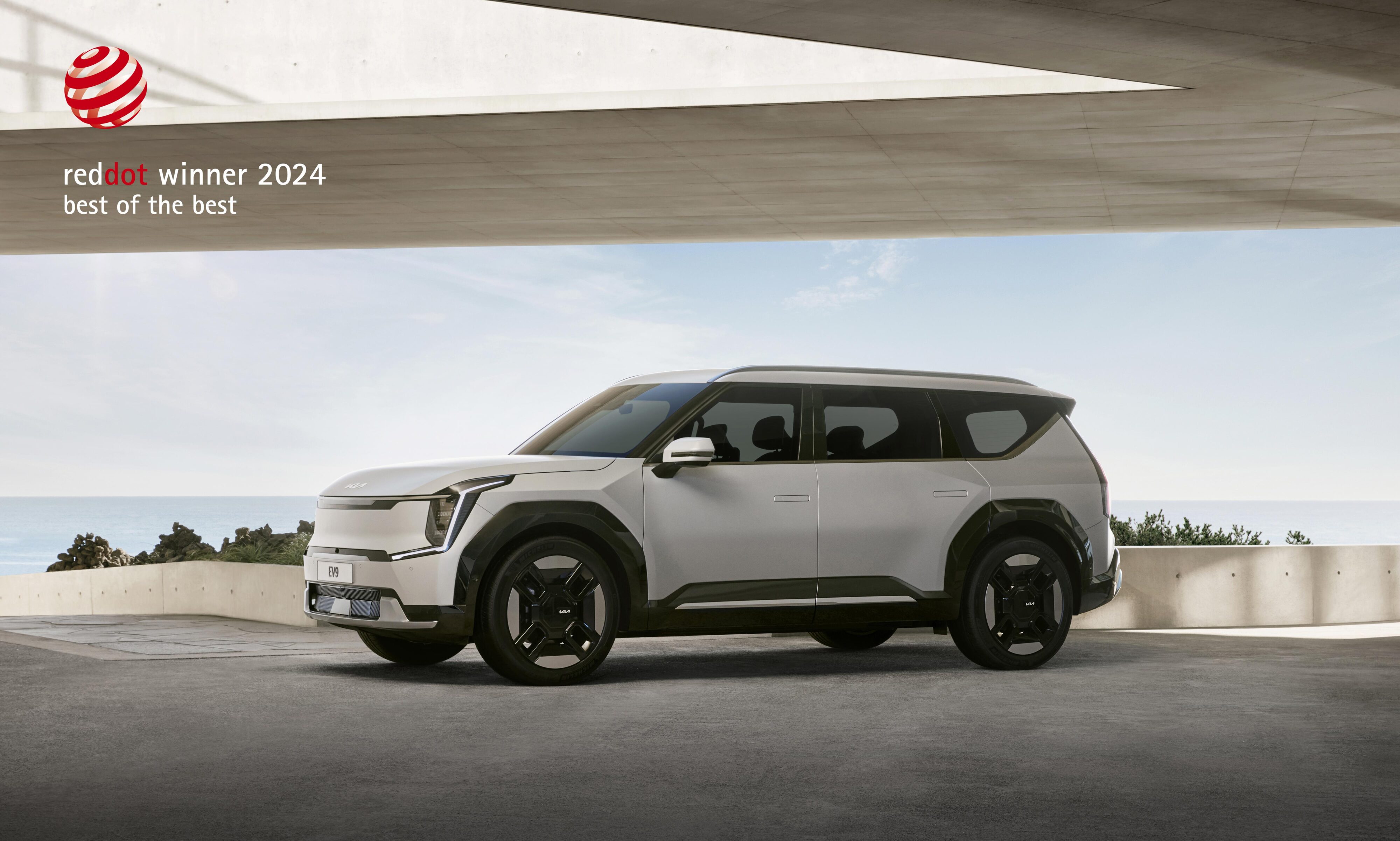 Promotional photo of the KIA EV9 winning the Red Dot 'Best of the Best' award 2024.