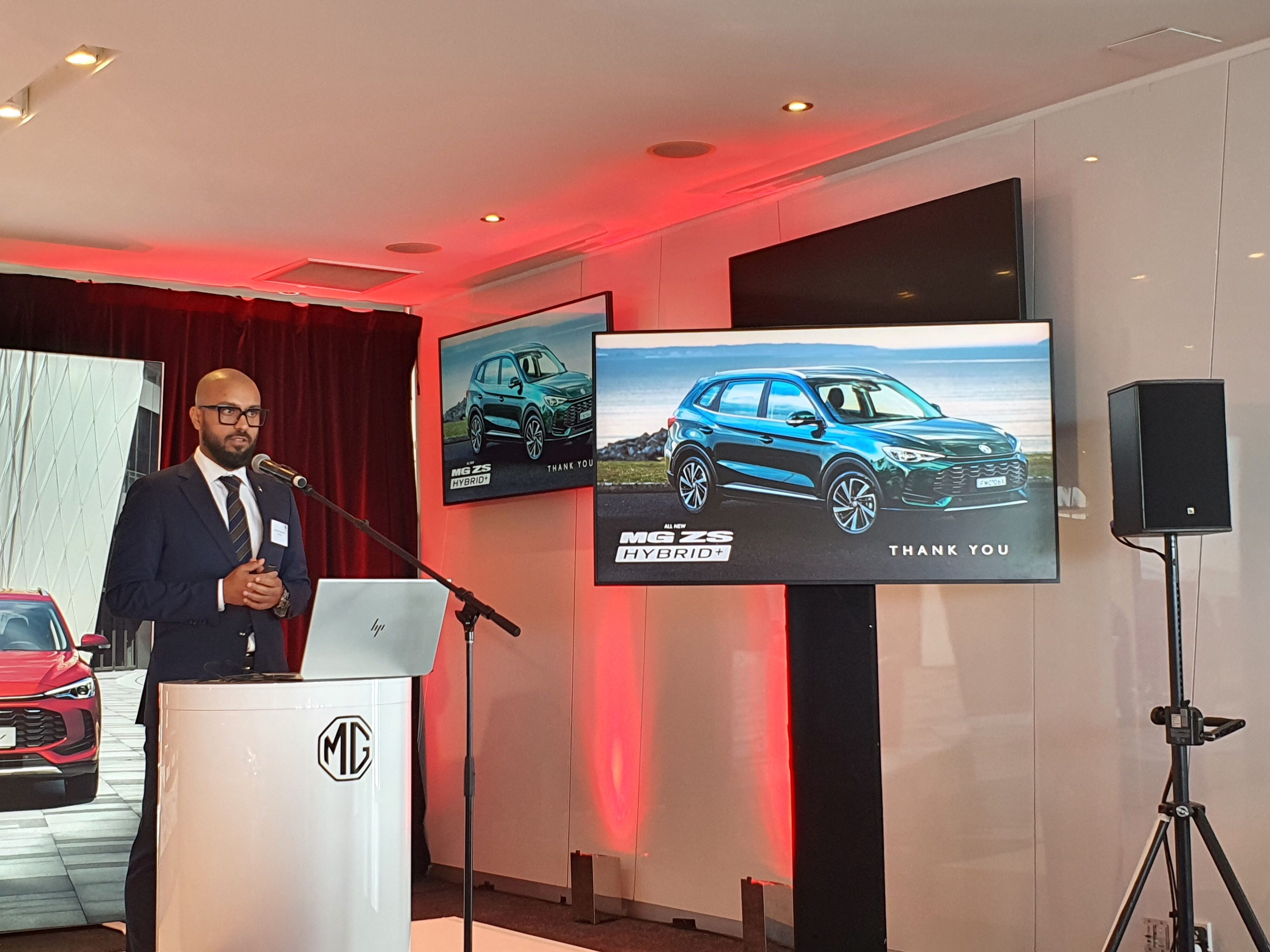 AK talking about the new ZS Hybrid+ at the New Zealand launch of the vehicle.