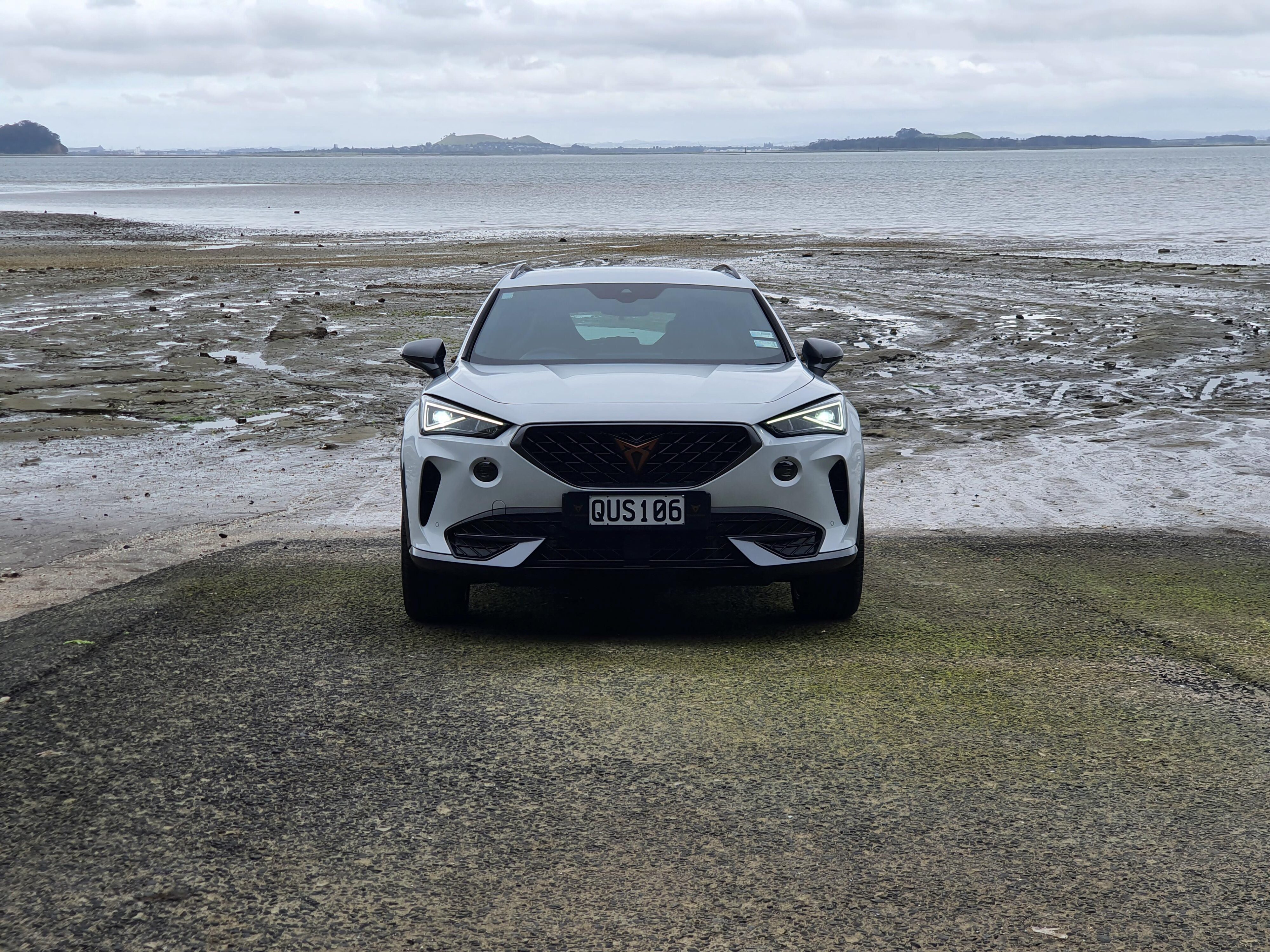 Front on view of a 2024 Cupra Formentor V e-Hybrid in white.