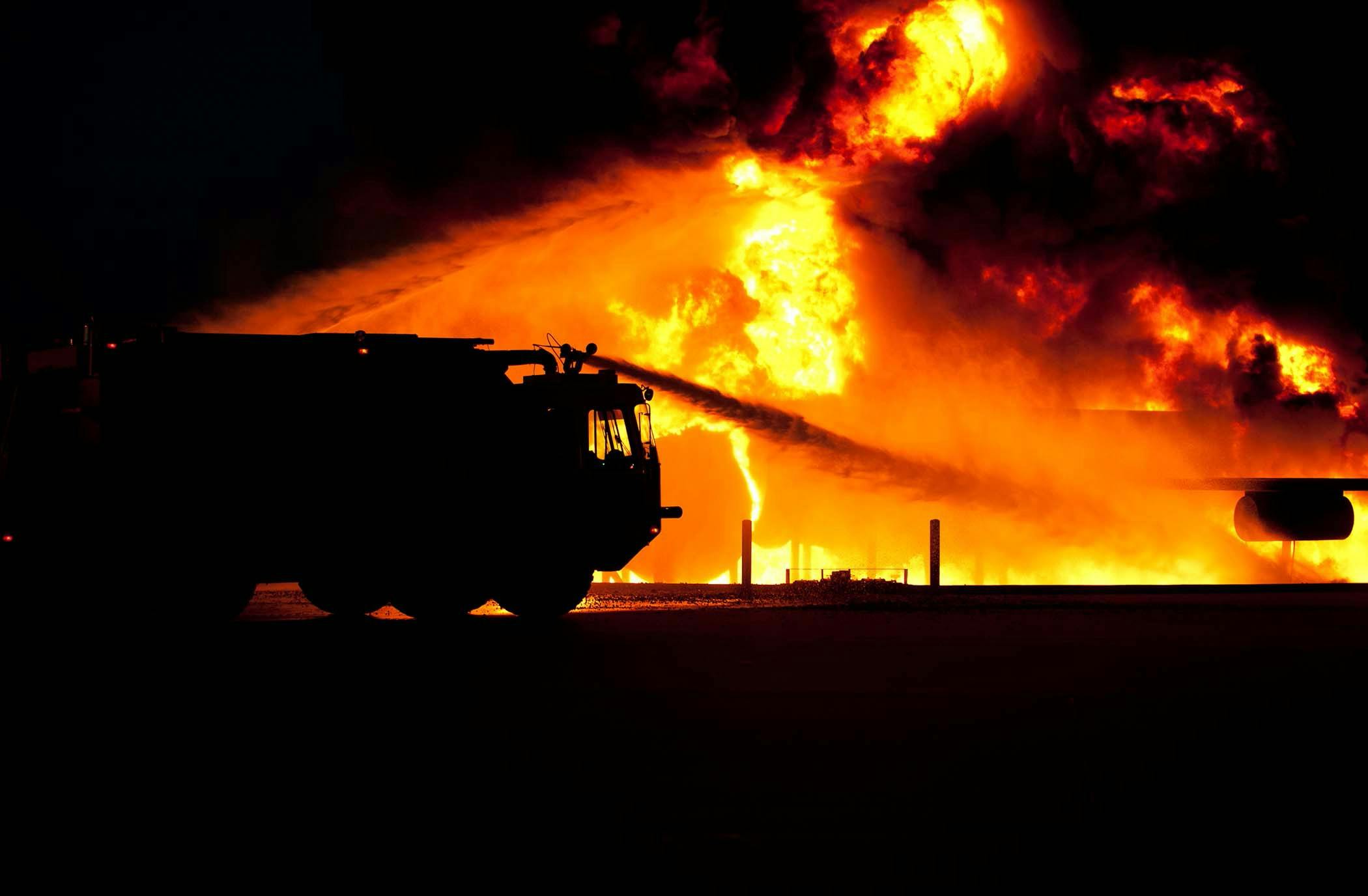 A firetruck attempts to put out a raging fire. Photo by Pixabay: https://www.pexels.com/photo/firetruck-spraying-water-on-fire-68138/