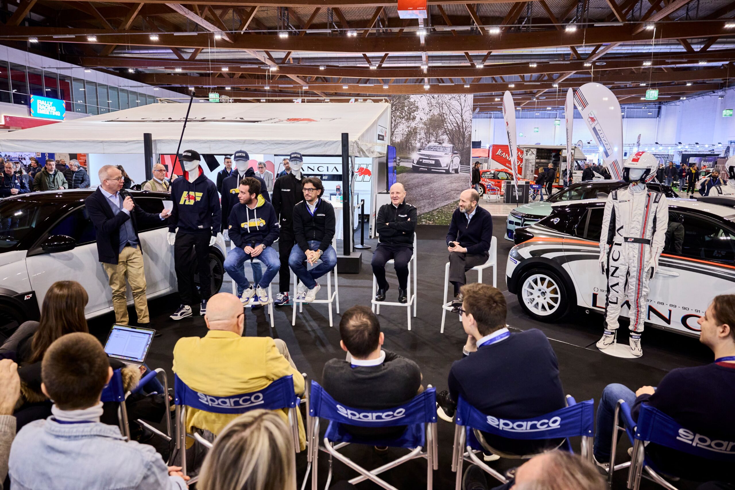 Lancia and Sparco unveiling their new motorsport inspired clothing range at the Lancia Rally Racing Meeting earlier this month.