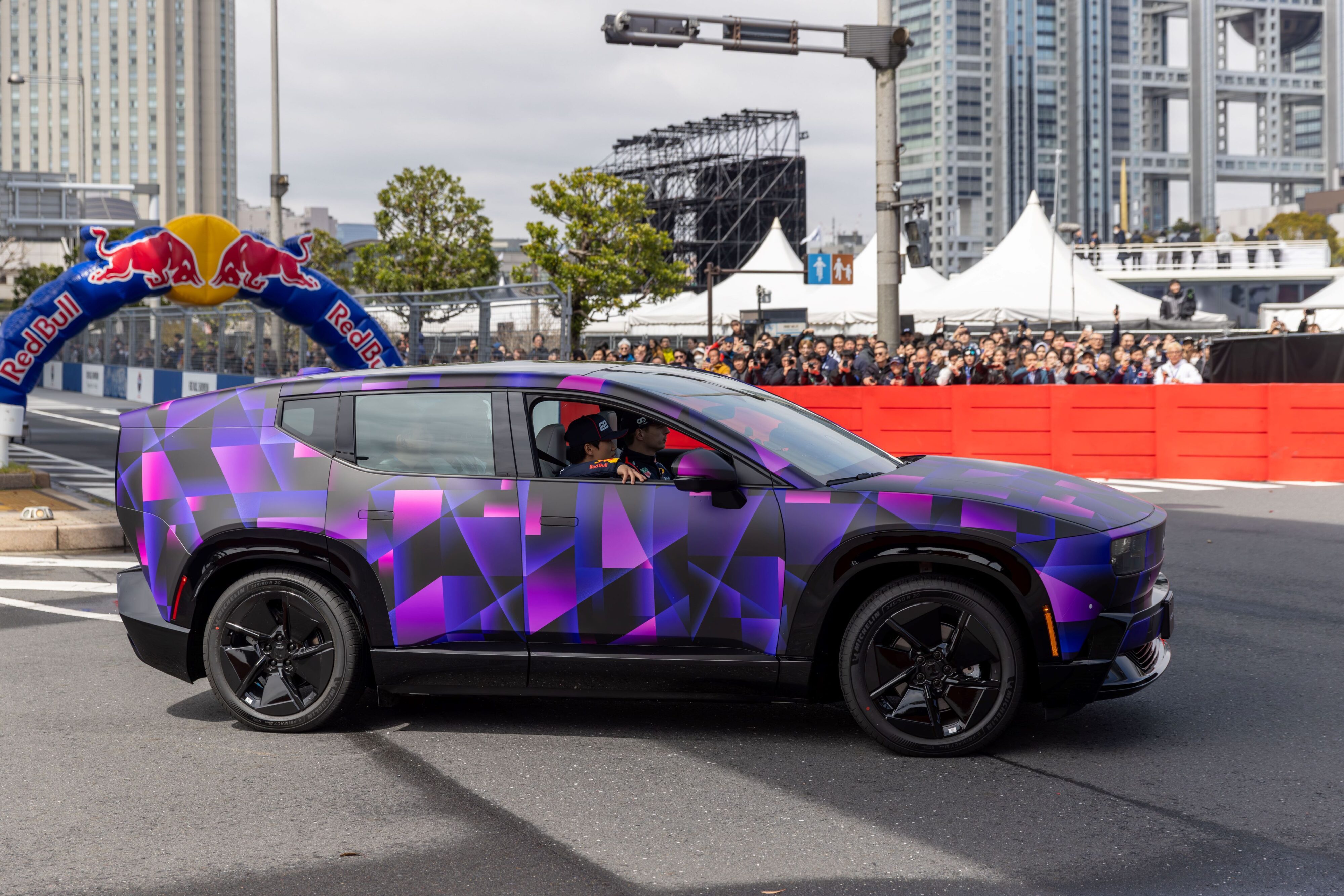 Red Bull F1 Team driver Max Verstappen behind the wheel of the Honda 0 Series SUV Concept.