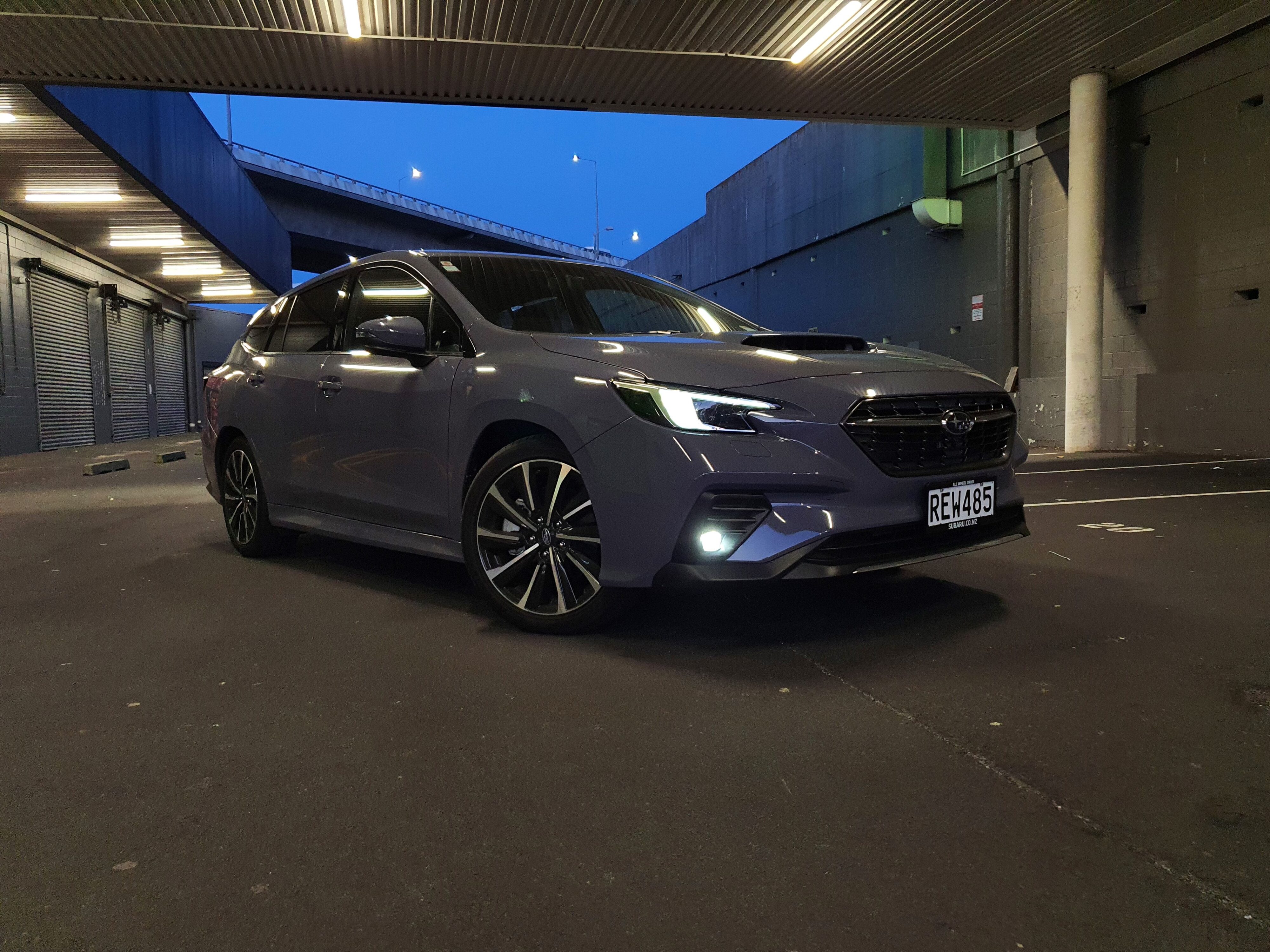 Front three quarters view of a 2025 Subaru WRX GT tS Wagon in Asteroid Grey Pearl.