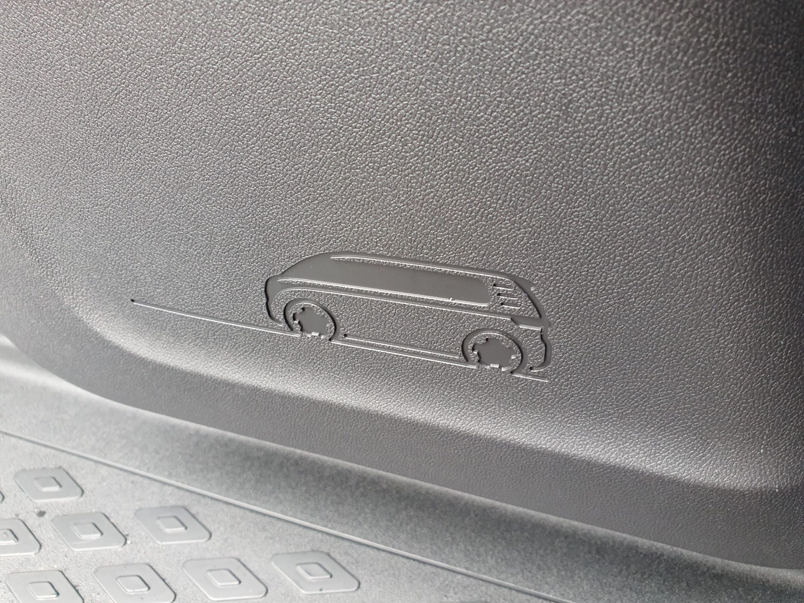 An ID.Buzz diagram on the inside of a 2025 Volkswagen ID.Buzz GTX in red and silver.