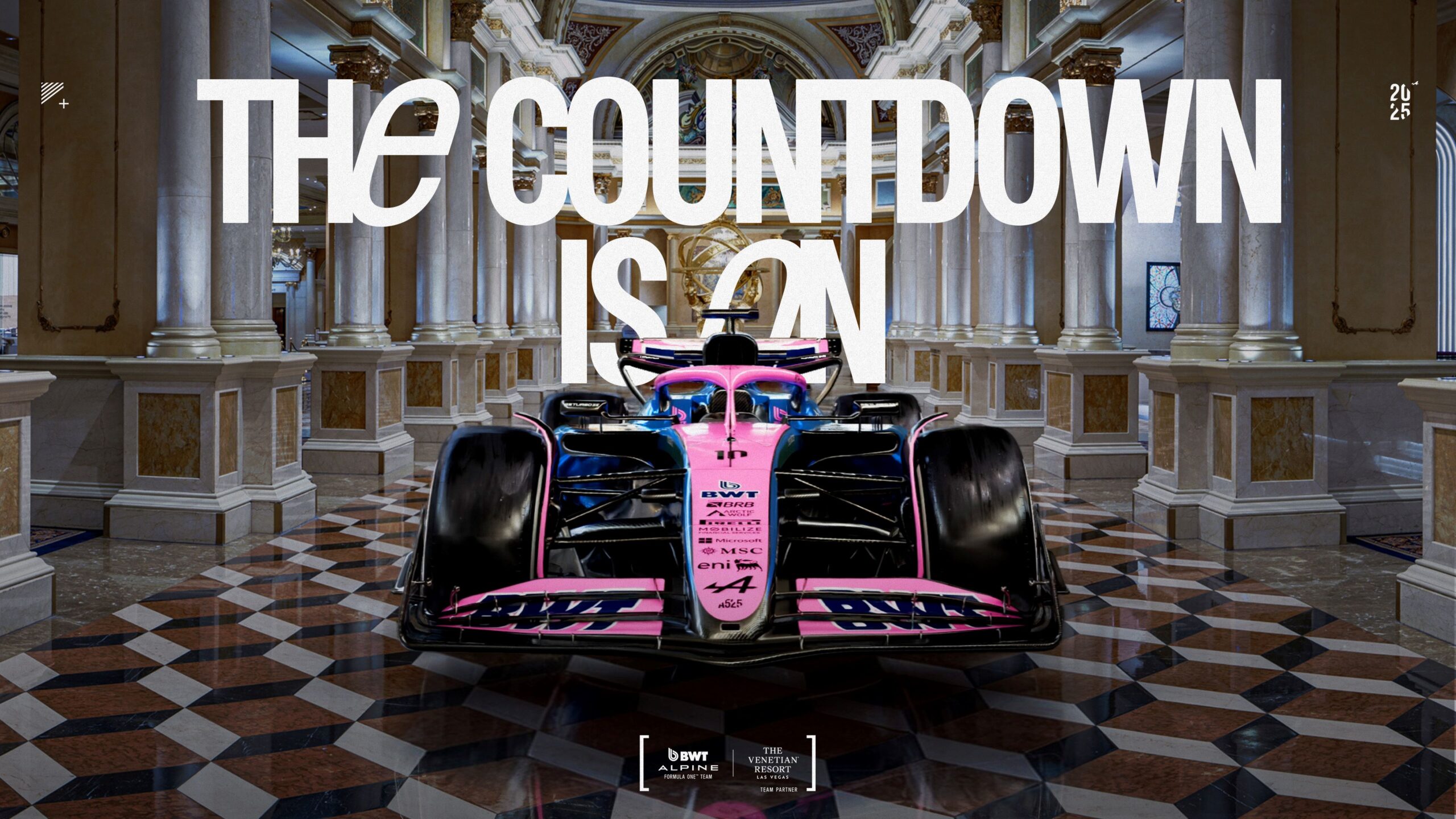 A photo of the BWT Alpine F1 Team racecar inside The Venetian Hotel in Las Vegas.