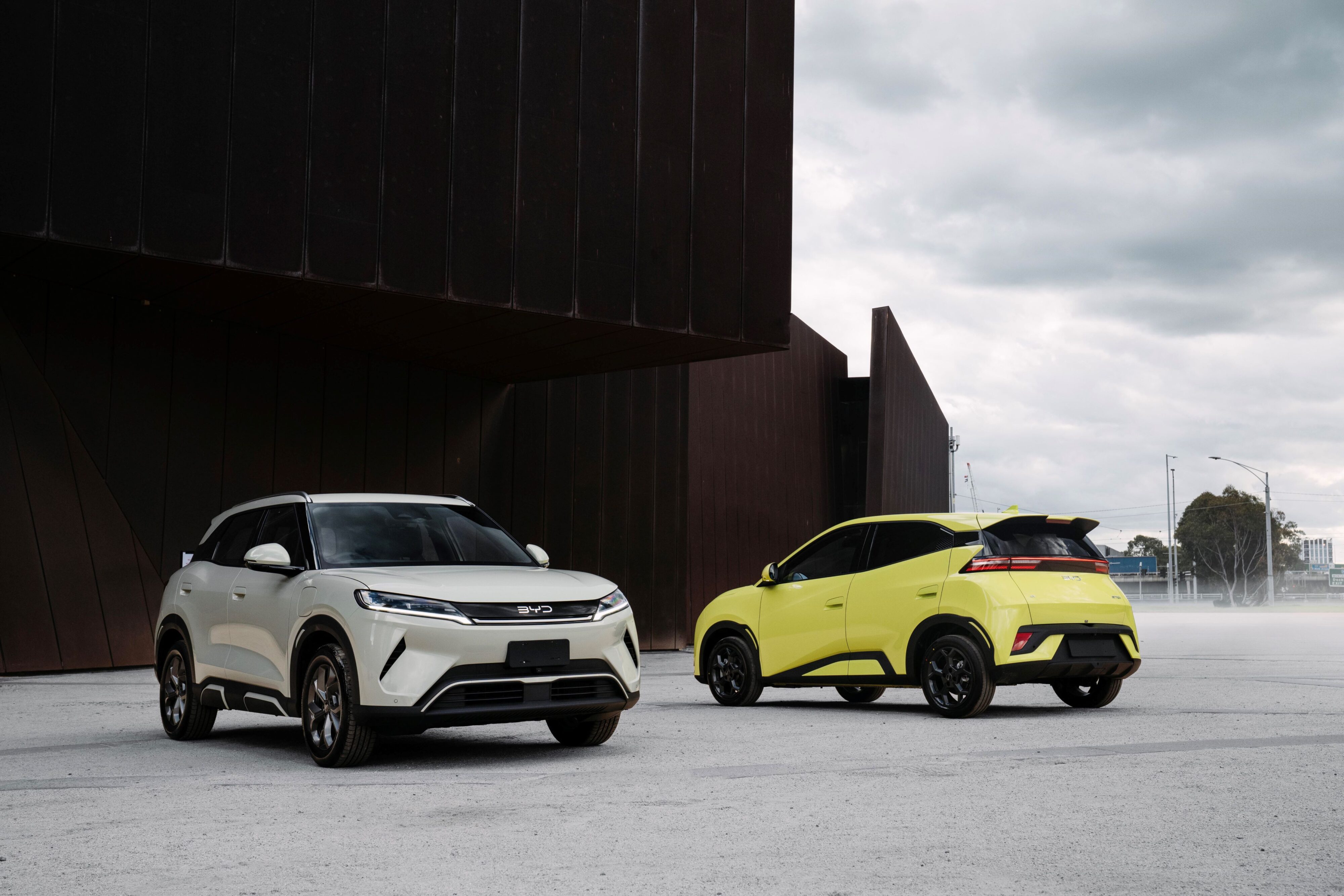 A photo of a BYD Atto 1 and 2 with the latter in the foreground.