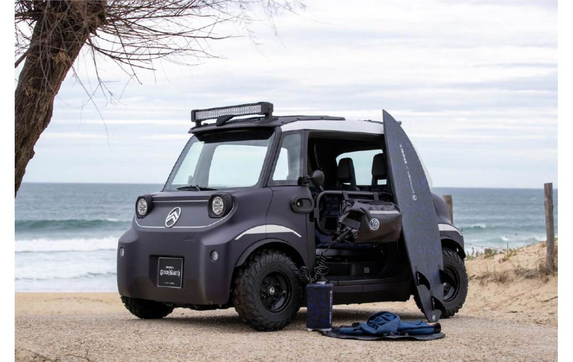 A photo of a black Citroen Ami Buggy Rip Curl Vision.