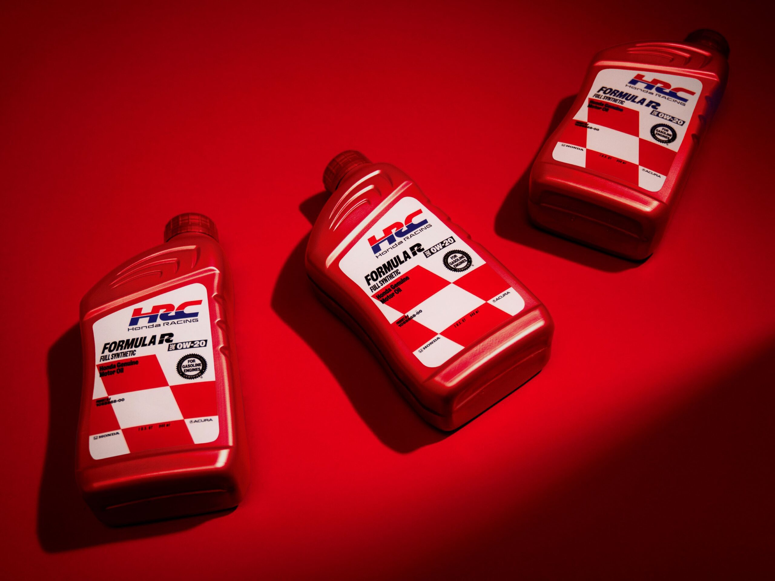 A photo of the new range of engine oils from Honda Racing Corporation.